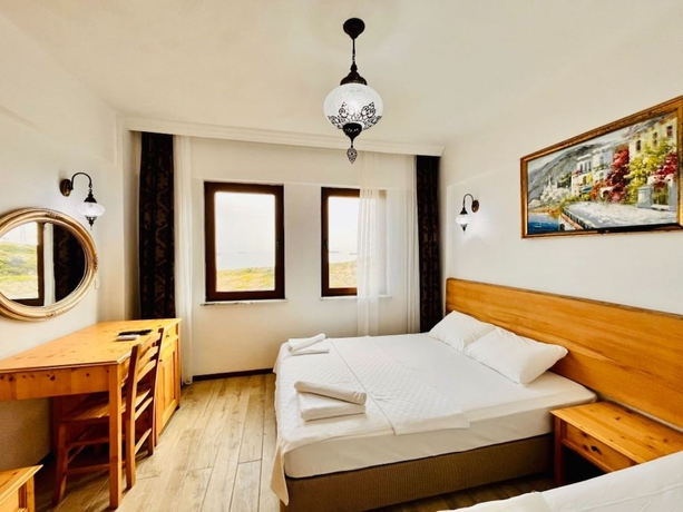 Imagen de la habitación del Sukha Inn Otel and Beach. Foto 6