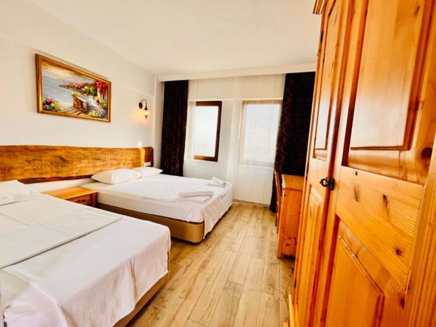 Imagen de la habitación del Sukha Inn Otel and Beach. Foto 7