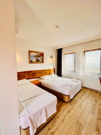 Imagen de la habitación del Sukha Inn Otel and Beach. Foto 8