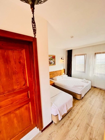 Imagen de la habitación del Sukha Inn Otel and Beach. Foto 9