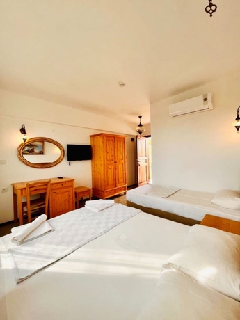 Imagen de la habitación del Sukha Inn Otel and Beach. Foto 10