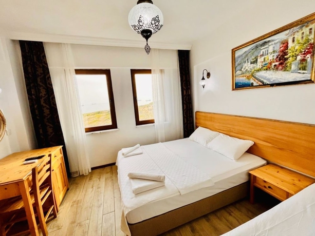 Imagen de la habitación del Sukha Inn Otel and Beach. Foto 11