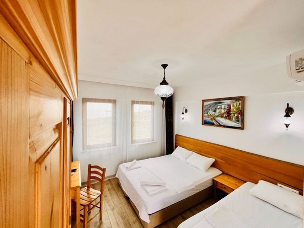 Imagen de la habitación del Sukha Inn Otel and Beach. Foto 12