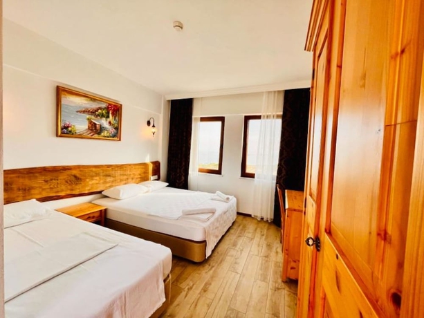 Imagen de la habitación del Sukha Inn Otel and Beach. Foto 15