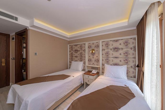 Imagen de la habitación del Sultan City Hotel. Foto 13
