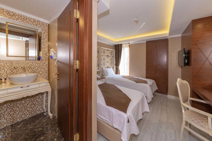 Imagen de la habitación del Sultan City Hotel. Foto 17