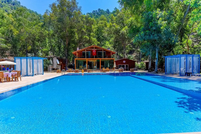 Imagen de la piscina del Suna Village Hotel and Bungalow Fethiye. Foto 18
