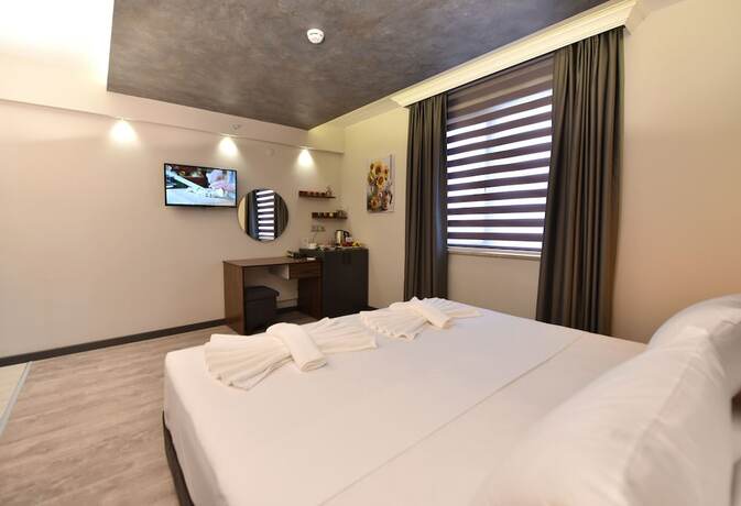 Imagen de la habitación del Sunflower Suites. Foto 19