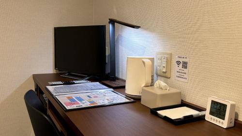 Imagen de la habitación del Sunnemu Hotel in Honjo. Foto 20