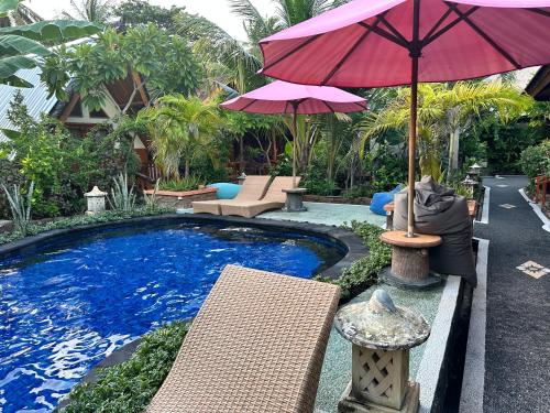 Imagen de la habitación del Sunny Rose Bungalows Gili Air. Foto 11