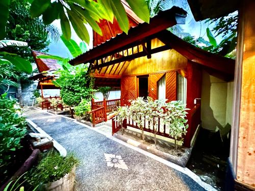 Imagen de la habitación del Sunny Rose Bungalows Gili Air. Foto 16