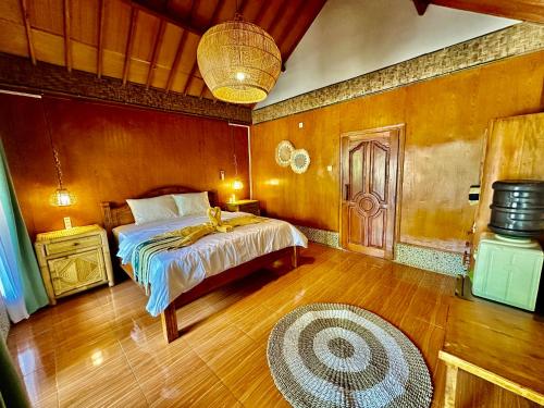 Imagen de la habitación del Sunny Rose Bungalows Gili Air. Foto 19