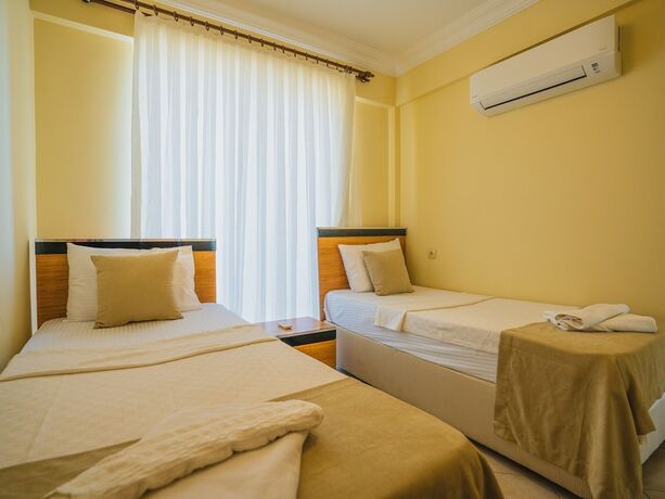 Imagen de la habitación del Sunset Beach Club Fethiye. Foto 18