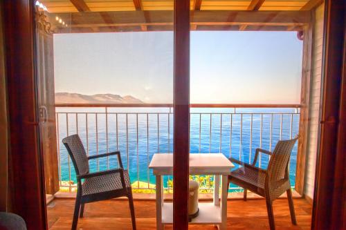 Imagen de la habitación del Sunset Villa Hotel. Foto 7