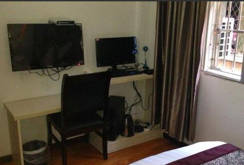 Imagen de la habitación del Sunshine Business Inn. Foto 10