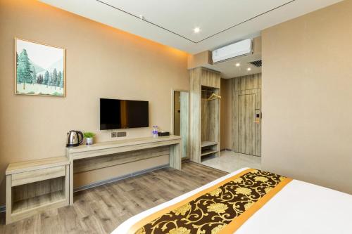 Imagen general del Suoxing Hotel Longxian Passenger Bus Station. Foto 2