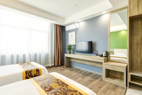 Imagen general del Suoxing Hotel Longxian Passenger Bus Station. Foto 6