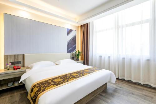 Imagen general del Suoxing Hotel Longxian Passenger Bus Station. Foto 10