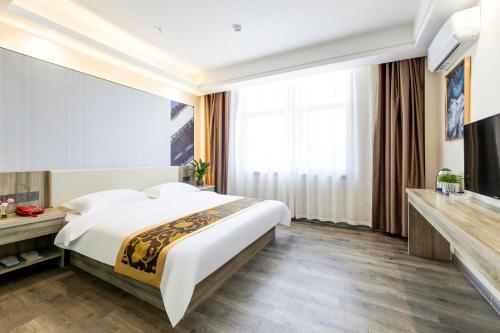 Imagen general del Suoxing Hotel Longxian Passenger Bus Station. Foto 11