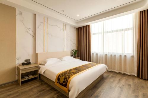 Imagen general del Suoxing Hotel Longxian Passenger Bus Station. Foto 14