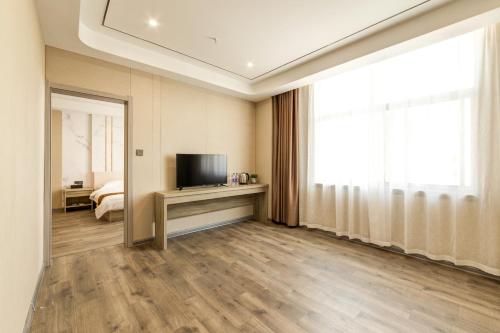 Imagen general del Suoxing Hotel Longxian Passenger Bus Station. Foto 15