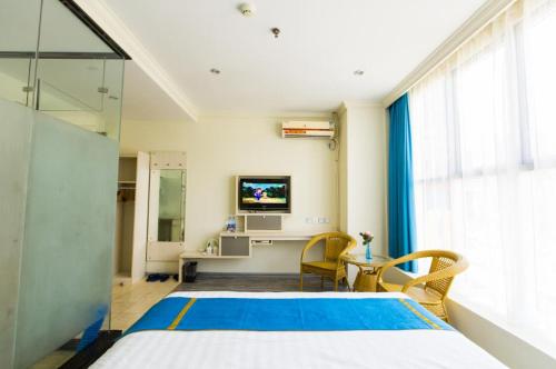 Imagen de la habitación del Super 8 Hotel Beihai Railway Station Branch. Foto 6