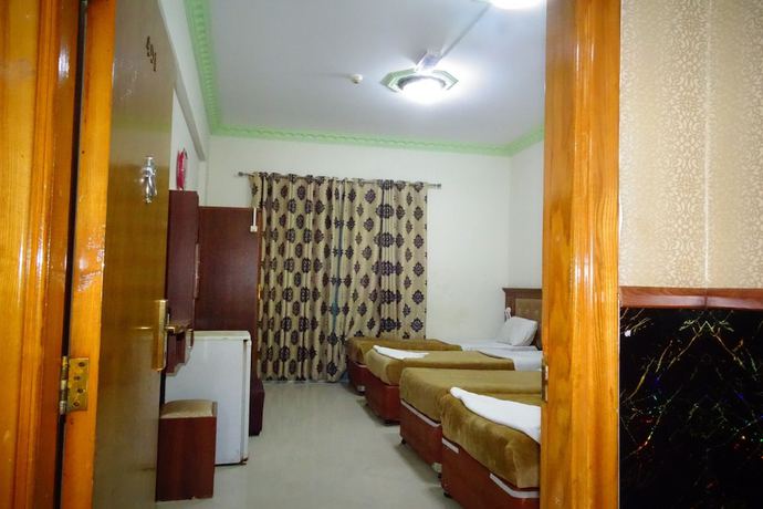 Imagen de la habitación del Super OYO 945 Dream Touch Hotel. Foto 2