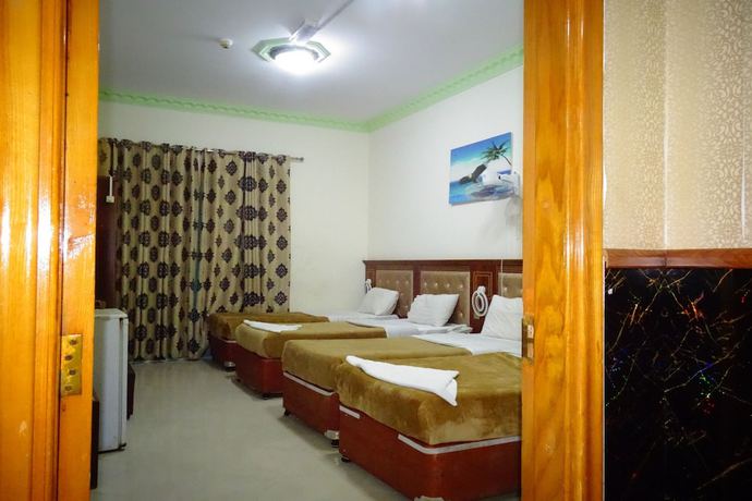 Imagen de la habitación del Super OYO 945 Dream Touch Hotel. Foto 3