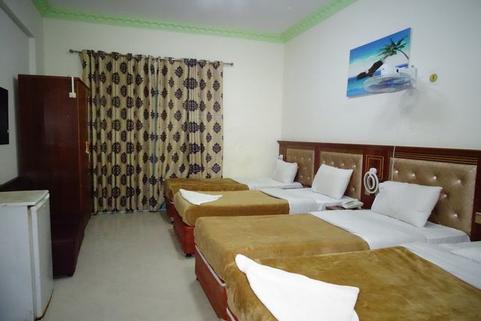Imagen de la habitación del Super OYO 945 Dream Touch Hotel. Foto 4
