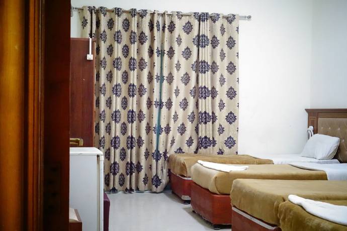 Imagen de la habitación del Super OYO 945 Dream Touch Hotel. Foto 5