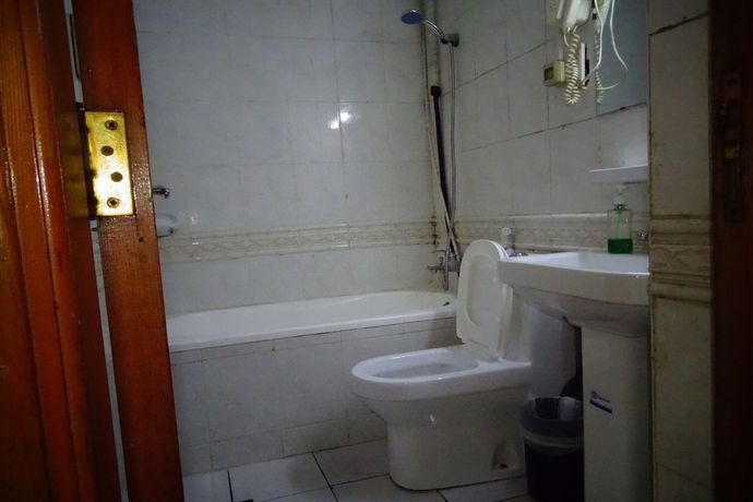 Imagen de la habitación del Super OYO 945 Dream Touch Hotel. Foto 7