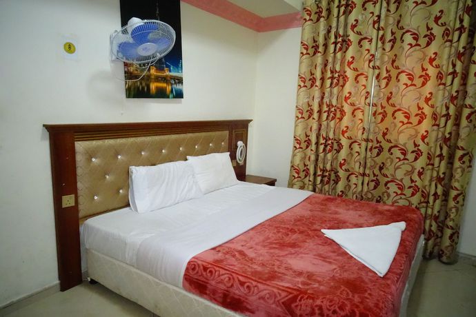 Imagen de la habitación del Super OYO 945 Dream Touch Hotel. Foto 8