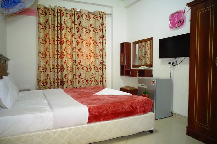 Imagen de la habitación del Super OYO 945 Dream Touch Hotel. Foto 9