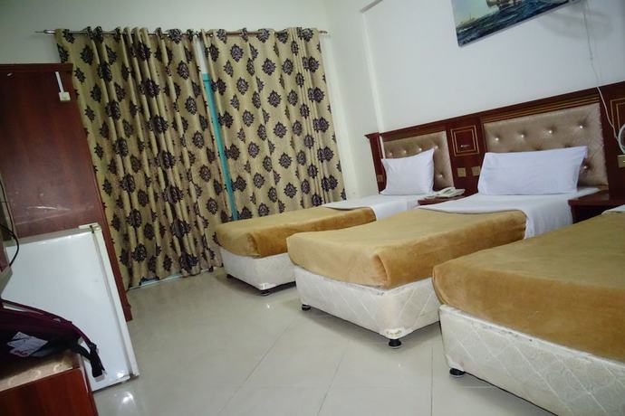 Imagen de la habitación del Super OYO 945 Dream Touch Hotel. Foto 10