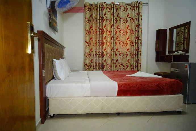 Imagen de la habitación del Super OYO 945 Dream Touch Hotel. Foto 11