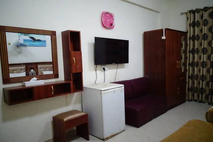 Imagen de la habitación del Super OYO 945 Dream Touch Hotel. Foto 12
