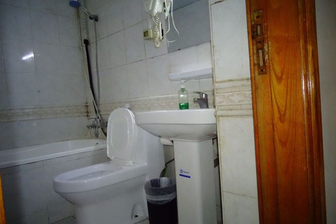 Imagen de la habitación del Super OYO 945 Dream Touch Hotel. Foto 13