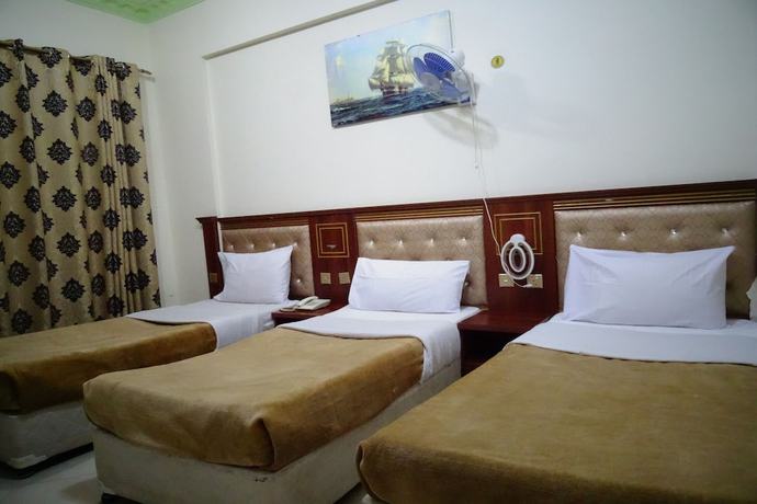 Imagen de la habitación del Super OYO 945 Dream Touch Hotel. Foto 14