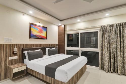 Imagen de la habitación del Super Townhouse Kankarbagh Formerly Kunwar Alcajars. Foto 18