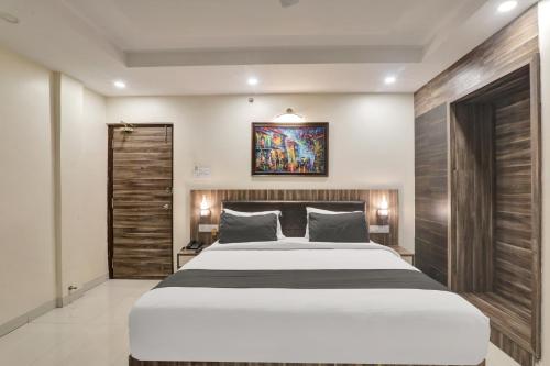 Imagen de la habitación del Super Townhouse Kankarbagh Formerly Kunwar Alcajars. Foto 20