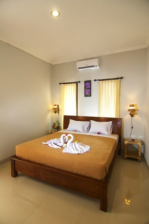 Imagen de la habitación del Suwardika Homestay & Dormitory. Foto 8