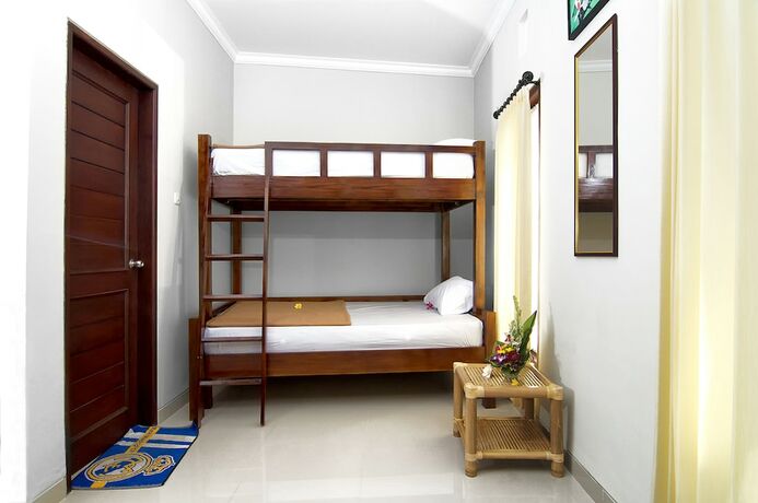 Imagen de la habitación del Suwardika Homestay & Dormitory. Foto 9