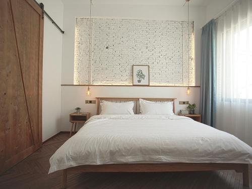 Imagen de la habitación del Suzhou Wuer Space Design Art Hotel. Foto 8