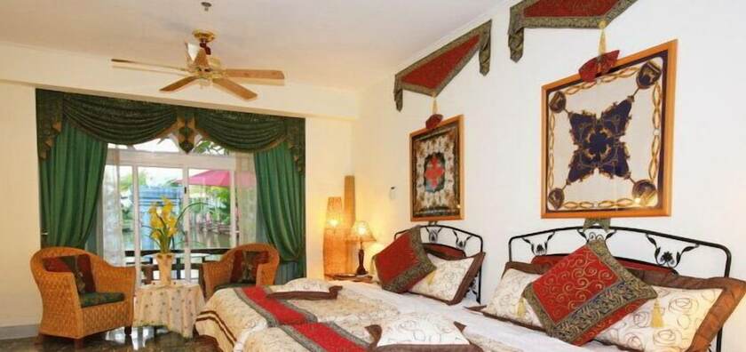 Imagen de la habitación del Swan Lake Villa Resort. Foto 31