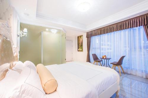 Imagen de la habitación del Sweet Time Inn Zhimeng Garden. Foto 5