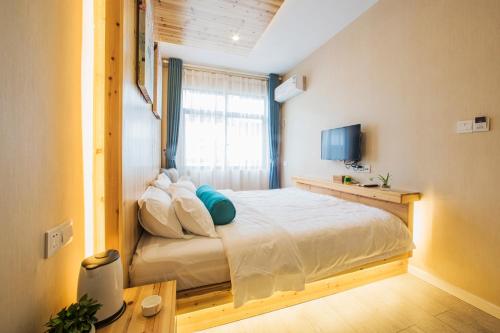 Imagen de la habitación del Sweet Time Inn Zhimeng Garden. Foto 9