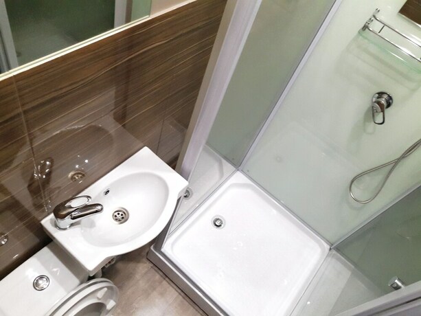 Imagen de la habitación del Sweet Village Hotel. Foto 16
