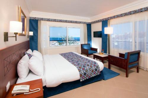 Imagen de la habitación del Swiss Wellness Dive Resort. Foto 19