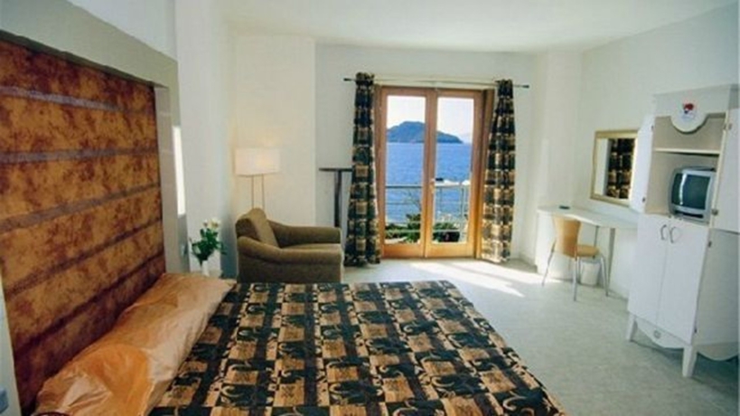 Imagen de la habitación del Synosse Hotel Turgutreis. Foto 4