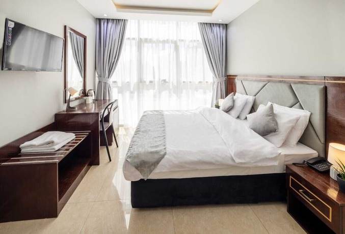 Imagen de la habitación del THE K HOTEL, Dubai. Foto 8